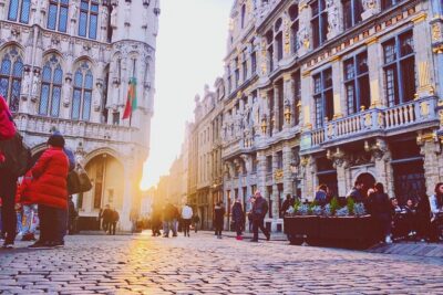Brussels Highlights Walking and Bus Tour w/ Waffle - Grand Place: UNESCO status and the fire-rebuild story you’ll remember