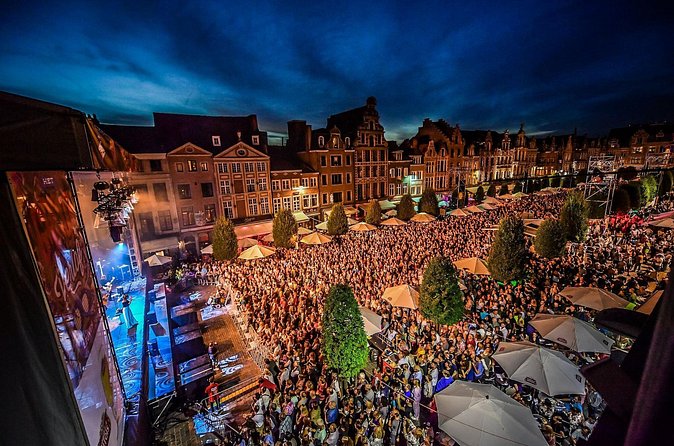 Leuven: City Walk with Audio Guide in 7 Languages on your Phone - Oude Markt: Leuven’s longest bar-in-a-square moment
